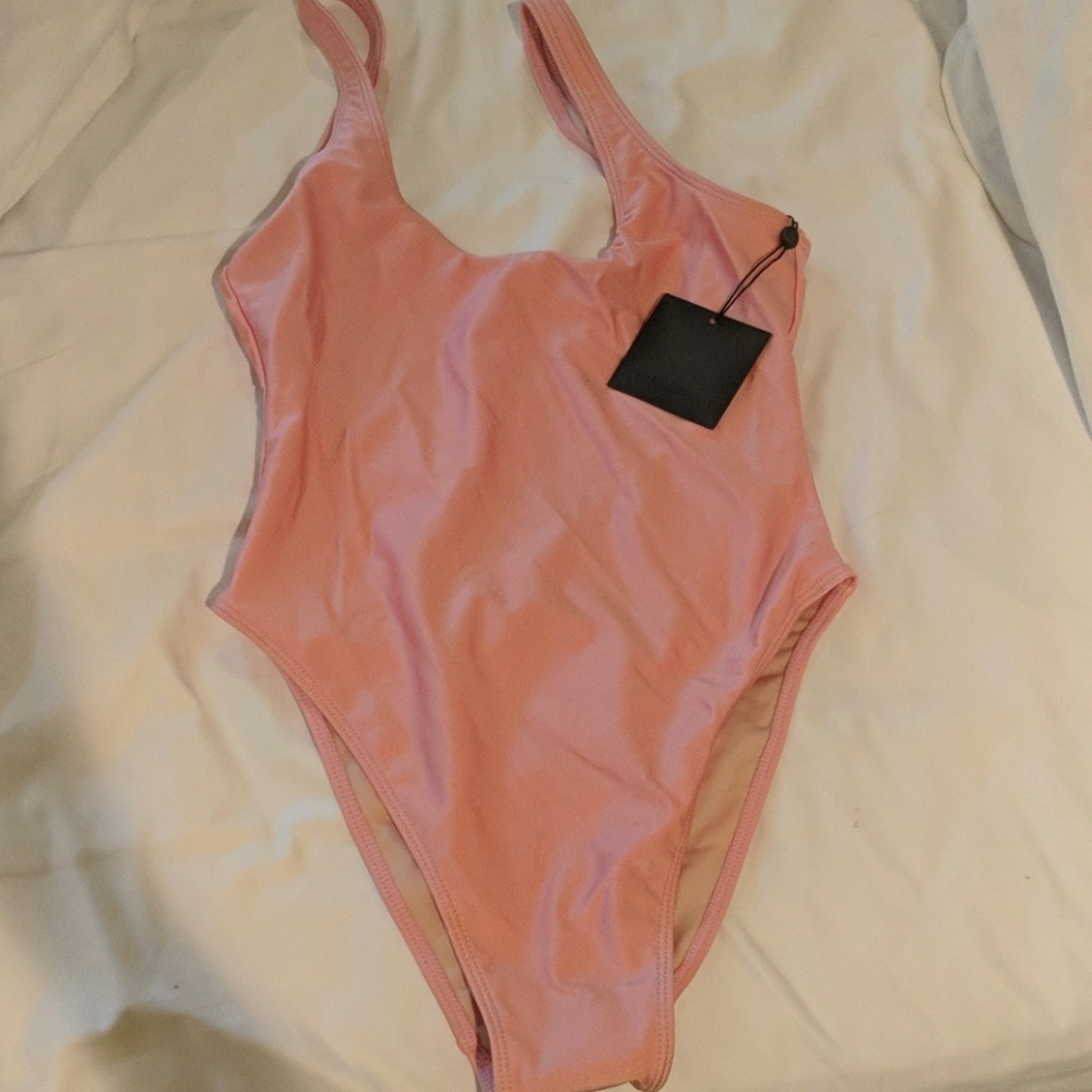 Low back, light pink swimsuit